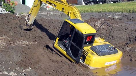 excavator stuck in mud